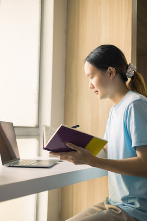 Young student eagerly enters the classroom, ready to immerse themselves in world of learning and...