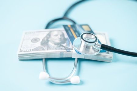 Stethoscope symbolizes essential medical care provided within health care system, health insurance plays crucial role in financing treatment and medicine to disease, concept of health management.の写真素材