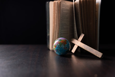 Missionary embarked on mission across the earth, armed with faith in Jesus Christ and a map, spreading the teachings of Christianity and the Bible to fulfill God's call within the Christian religion.の写真素材