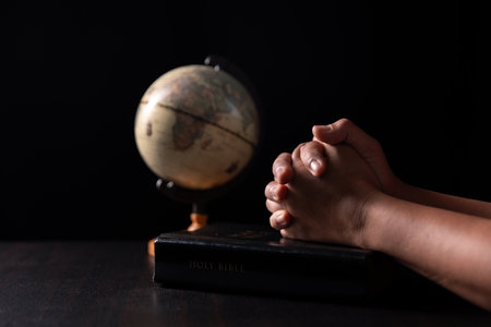 Missionary embarked on mission across the earth, armed with faith in Jesus Christ and a map, spreading the teachings of Christianity and the Bible to fulfill God's call within the Christian religion.の写真素材