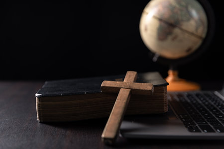 Missionary embarked on mission across the earth, armed with faith in Jesus Christ and a map, spreading the teachings of Christianity and the Bible to fulfill God's call within the Christian religion.の写真素材