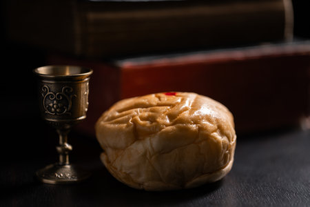 Communion, Christians celebrate their faith by partaking in bread and wine, symbolizing the body and blood of Jesus Christ, as taught in the Bible and cherished in their holy religion. communion, holyの写真素材