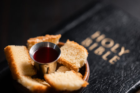 Communion, Christians celebrate their faith by partaking in bread and wine, symbolizing the body and blood of Jesus Christ, as taught in the Bible and cherished in their holy religion. communion, holyの写真素材
