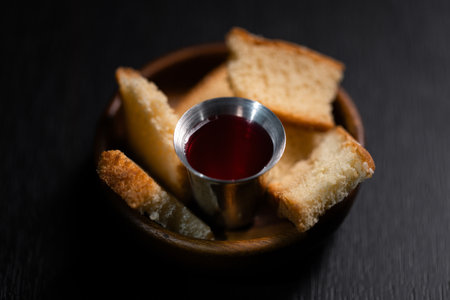 Christian religion, believers partake in Holy Communion, sacred eucharist sacrament symbolizing bread and blood of Christ, deepening their spirituality and faith. communion, christian, holy, religionの写真素材