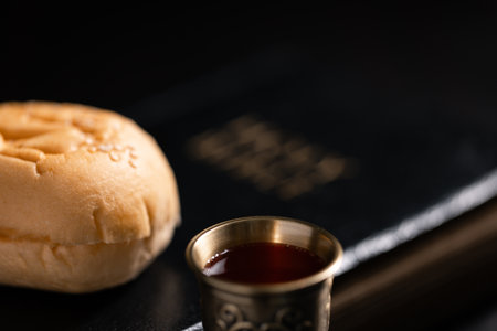 Communion, Christians celebrate their faith by partaking in bread and wine, symbolizing the body and blood of Jesus Christ, as taught in the Bible and cherished in their holy religion. communion, holyの写真素材
