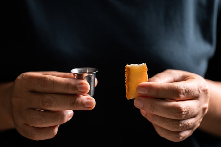 Sacred ceremony of Communion, Christians express their faith by partaking in holy bread, deepening their spiritual connection with God within the church. communion, religion, christian, faith, holy.の写真素材