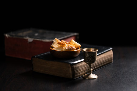 Communion, Christians celebrate their faith by partaking in bread and wine, symbolizing the body and blood of Jesus Christ, as taught in the Bible and cherished in their holy religion. communion, holyの写真素材
