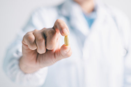 Doctor at the clinic provided the patient with prescription for medicine to manage their disease, ensuring they receive proper health care at the hospital. disease, doctor, medicine, patient, clinic.の写真素材