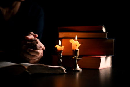 In the church, candle flickered beside cross as Christians gathered to pray, their faith in Jesus...