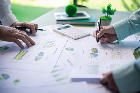 Business meeting on sustainable real estate development. real estate, sustainable development, business meeting, green building, eco-friendly, architecture, planning, construction, investment.の写真素材