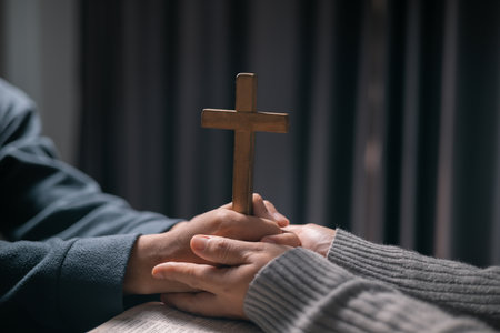 In moment of meditation, the congregation began praying and praising, seeking the grace and forgiveness of the Holy Spirit, as they embraced the spirit of fellowship and the teachings of the gospel.の写真素材