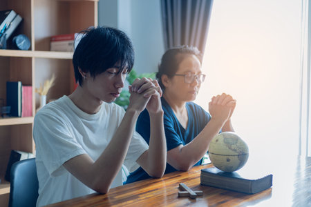Pray for world peace Hope that faith in God and religious unity will unite humanity around the world and bring brighter day to everyone on earth. Religion Day Faith Peace Humanity. globe, day, faith.の写真素材