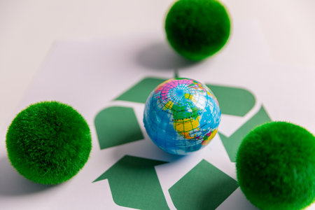 Recycling is green concept and symbol of our commitment to conserving nature and earth, as it addresses waste and promotes environmental conservation signs. plastic, simple, ecosystem, efficiency, gasの写真素材