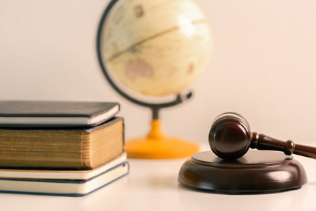 In court lawyer cited book of law as judge, holding gavel, pronounced judgement with authority of legal justice, determining punishment to be auctioned. responsible, regulation, prosecution, integrityの写真素材