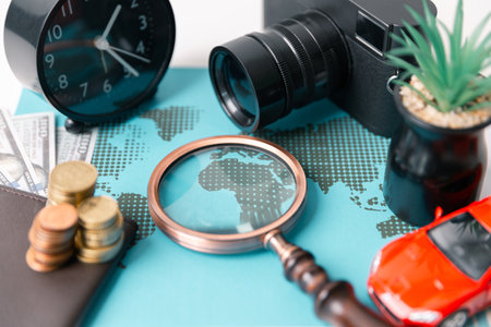Concept of travel inspires many to explore world, using map to plan their journey and embark on tour or voyage that takes them around earth on an unforgettable trip. guide, insurance, location, moneyの写真素材