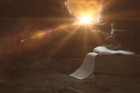 Easter resurrection concept. Jesus Christ resurrection. Empty tomb of Jesus with light. Born to Die, Rise. savior messiah redeemer gospel alive miracle. Christian religion. He is not here he is risenの写真素材