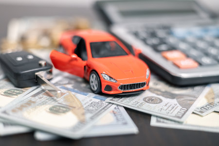 Finance bank tax expense accounting budget money businessman hand for Business expense analysis saving use car Financial calculate accountant close up calculator with graph chart write office deskの写真素材