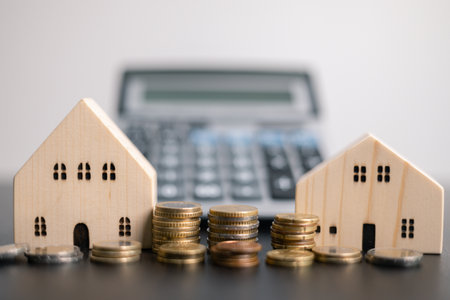 Finance bank tax expense accounting budget money businessman home for Business expense analysis saving use Financial calculate accountant close up calculator with graph chart hand write office deskの写真素材