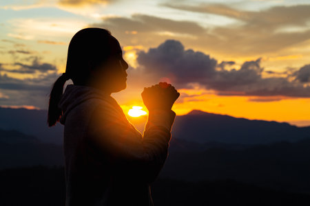 Close up hands pray to God with spiritual faith on holy bible in church religion worship prayer ask god bless pray grace jesus believe religion prayer holy worship.の写真素材