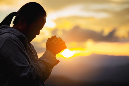 Close up hands pray to God with spiritual faith on holy bible in church religion worship prayer ask god bless pray grace jesus believe Christianity religion prayer holy worship.の写真素材