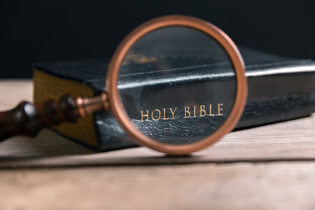 Religious belief concept Close up prayer Christian church service Bible Holy cross Spiritual power Blurred background Desk copy space Heaven God Catholic faith Praise book Jesus worship Gospel symbolsの写真素材
