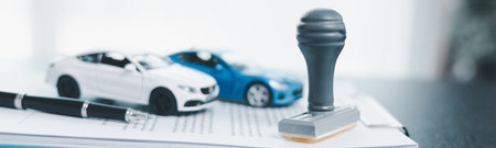 Banner of approved car loan application with key, rubber stamp and calculator concept. financial document on wooden table. Asset approval purchases to buy car. Ideas for car buy checklist loan taxの写真素材