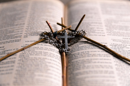 Religious belief concept Close up prayer Christian church service Bible Holy cross Spiritual power Blurred background Desk copy space Heaven God Catholic faith Praise book Jesus worship Gospel symbolsの写真素材