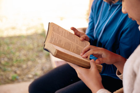 Christian pray god close up spirit holy bible hand faith catholic church religion worship prayer ask bless grace jesus believe christianity christ pastors mercy generous sacrifice plead earth humanの写真素材