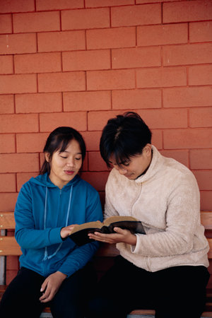 Christian pray god close up spirit holy bible hand faith catholic church religion worship prayer ask bless grace jesus believe christianity christ pastors mercy generous sacrifice plead earth humanの写真素材