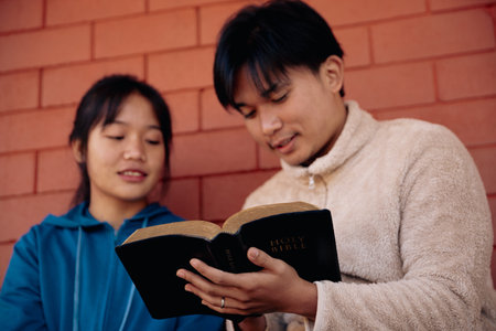 Christian pray god close up spirit holy bible hand faith catholic church religion worship prayer ask bless grace jesus believe christianity christ pastors mercy generous sacrifice plead earth humanの写真素材