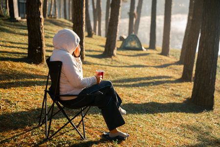 Business concept of cafe focuses on nurturing coffee in harmony with nature, organic seed create warm cup caffeine, background green fresh great outdoor. aromatic drink, rich aroma of rising from mugの写真素材