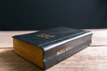 Religious belief concept Close up prayer Christian church service Bible Holy cross Spiritual power Blurred background Desk copy space Heaven God Catholic faith Praise book Jesus worship Gospel symbolsの写真素材