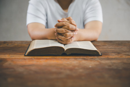 Christian woman reading bible. Reading Holy Bible. Concept for faith, spirituality and religion....