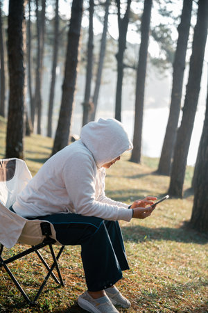 Future remote work combines technology nature smart phone enable e-learning productivity while traveling blending comfort modern devices serenity computer equipment business connection natural worldの写真素材