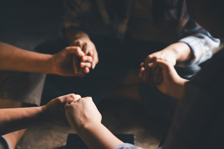 Close up group christians hands pray to God with spiritual faith on holy bible in catholic church. religion worship prayer ask god bless grace jesus believe. Christianity religion prayer holy worshipの写真素材