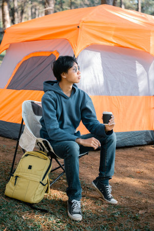 Business concept of cafe focuses on nurturing coffee in harmony with nature, organic seed create warm cup caffeine, background green fresh great outdoor. aromatic drink, rich aroma of rising from mugの写真素材