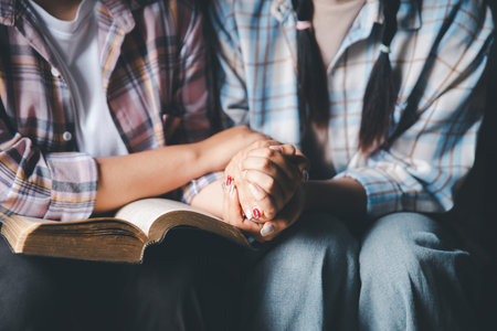 Praying religion, worship and group of people pray to God, Family, holding hands and prayer in home...