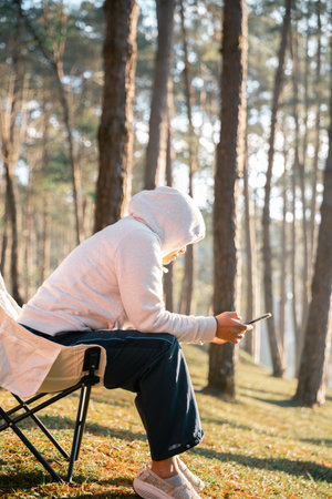 Future remote work combines technology nature smart phone enable e-learning productivity while traveling blending comfort modern devices serenity computer equipment business connection natural worldの写真素材