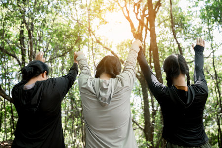 Grateful woman having HOPE. Spiritual girl smiling to sky. Happy female being thankful. Spiritual girl praying with hope. Positive Asian young woman feeling hope and faith looking up.の写真素材