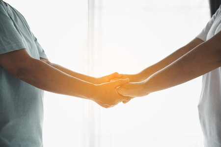 Hope and trust with crisis concept. Closeup, love and holding hands for support, comfort and care...