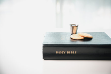 Christianity, holy communion ceremony is sacred act of worship and faith, where bread and wine in...