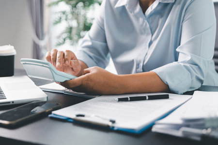 Business person with contract law and paper work for business finance, loan application form, contract real estate and insurance concept. signing contract, working on desk, business documentの写真素材