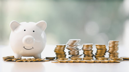Money box filled with coins, saving cash, banking wisely, making sound investments can build...