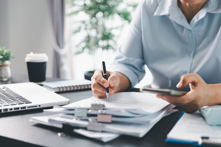 Business person with contract law and paper work for business finance, loan application form, contract real estate and insurance concept. signing contract, working on desk, business documentの写真素材