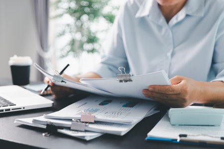 Business person with contract law and paper work for business finance, loan application form, contract real estate and insurance concept. signing contract, working on desk, business documentの写真素材