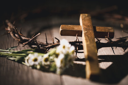 Closeup of Jesus Christ wearing crown of thorns during His crucifixion captures the suffering, sacrifice, and deep spirituality that define Easter and the core of Christian faith and religion.の写真素材