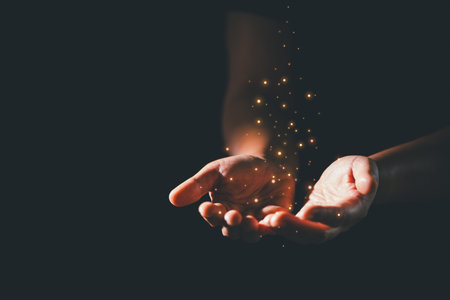 Dark silence of the church, a Christian lifts their hand in prayer to God, a symbol of worship, faith, and hope-embracing the spiritual concept of religion and believing in Jesus Christ.の写真素材