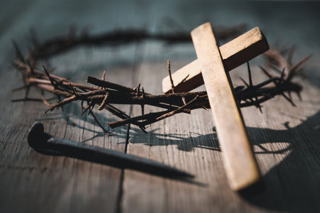 Closeup of Jesus Christ wearing crown of thorns during His crucifixion captures the suffering,...