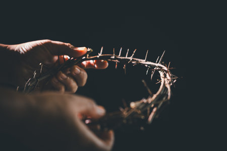 Closeup of a person wearing crown of thorns during His crucifixion captures the suffering,...