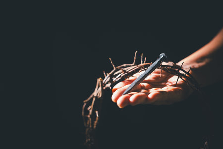 Closeup of Jesus Christ wearing crown of thorns during His crucifixion captures the suffering, sacrifice, and deep spirituality that define Easter and the core of Christian faith and religion.の写真素材